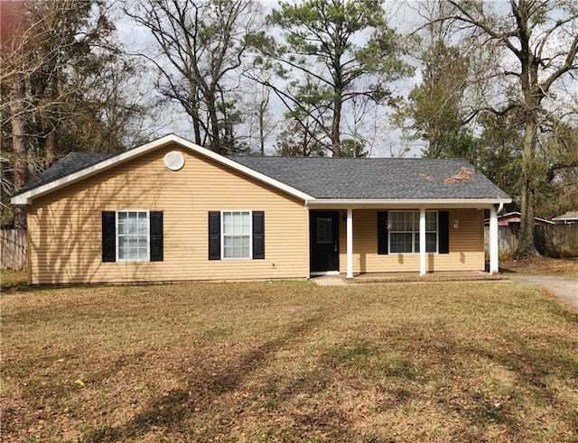 single story home featuring a porch and a front yard