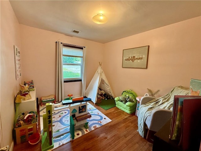 7020 Moffett Rd, Mobile, AL 36618 - rec room featuring wood finished floors