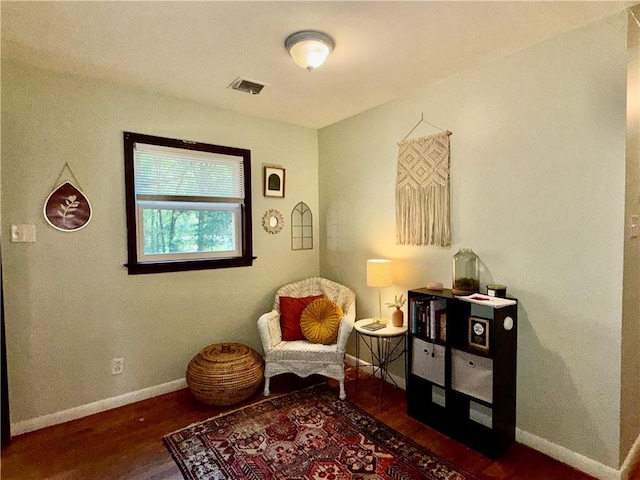 7020 Moffett Rd, Mobile, AL 36618 - sitting room featuring wood finished floors and baseboards