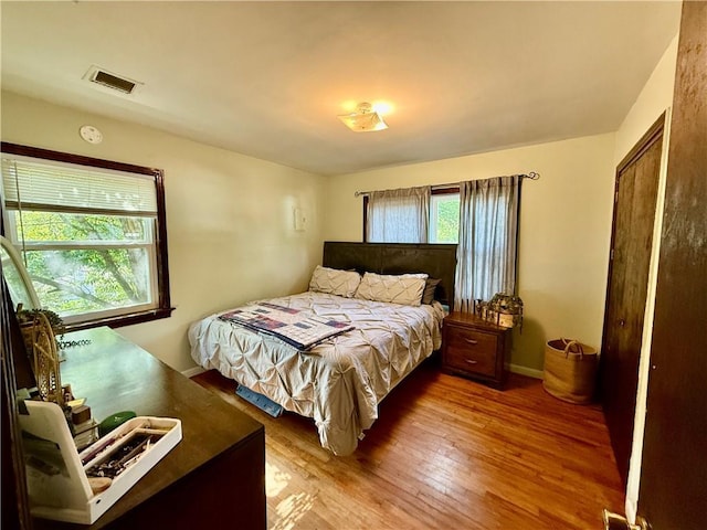 7020 Moffett Rd, Mobile, AL 36618 - bedroom with wood finished floors