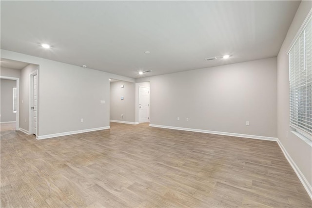 empty room featuring light hardwood / wood-style floors