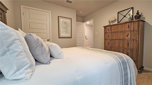 bedroom featuring carpet