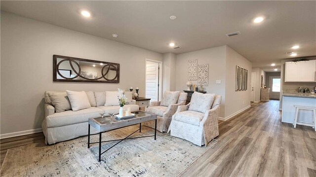 living room featuring light wood-type flooring