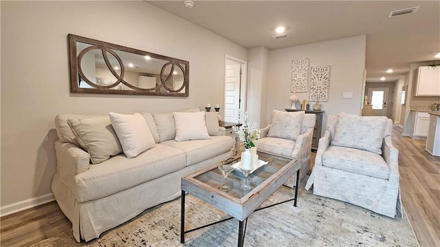 living room featuring light hardwood / wood-style flooring