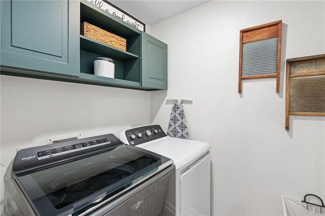 2526 Windmere Dr E, Semmes, AL 36575 - laundry room with cabinet space and washer and dryer