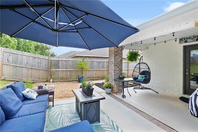 2526 Windmere Dr E, Semmes, AL 36575 - view of patio / terrace featuring fence and an outdoor hangout area