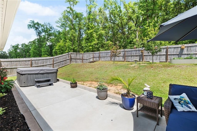 2526 Windmere Dr E, Semmes, AL 36575 - view of patio featuring a fenced backyard and a hot tub