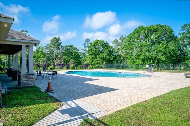2526 Windmere Dr E, Semmes, AL 36575 - view of swimming pool with fence, a fenced in pool, and a patio area
