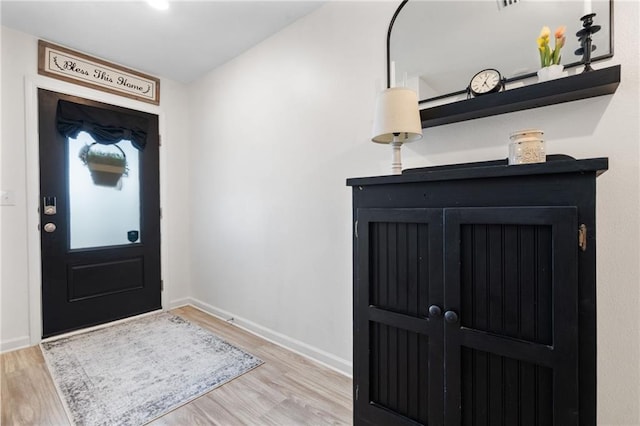 2526 Windmere Dr E, Semmes, AL 36575 - foyer with baseboards and wood finished floors
