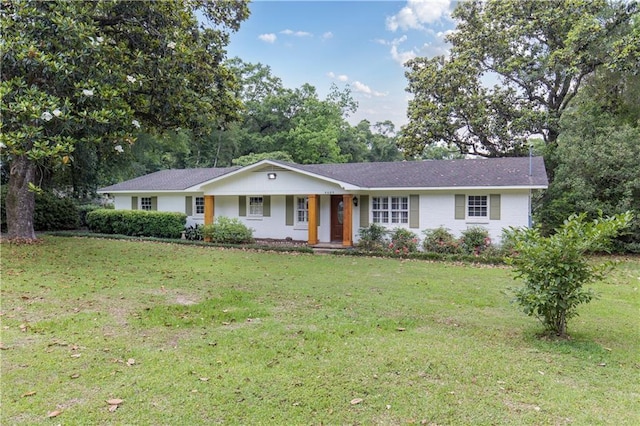 4689 Oak Ridge Rd, Mobile, AL 36609 - ranch-style home with a front yard, a porch, and view of scattered trees
