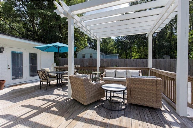 4689 Oak Ridge Rd, Mobile, AL 36609 - wooden terrace featuring a fenced backyard, outdoor dining area, outdoor lounge area, and a pergola