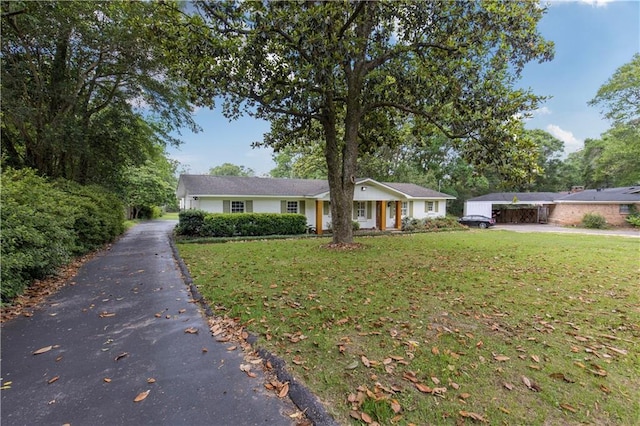 4689 Oak Ridge Rd, Mobile, AL 36609 - ranch-style home featuring driveway and a front lawn