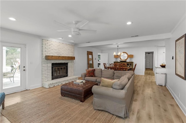 4689 Oak Ridge Rd, Mobile, AL 36609 - living area with a ceiling fan, ornamental molding, light wood finished floors, a fireplace, and recessed lighting