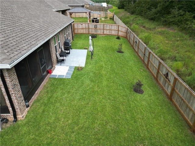 view of yard featuring a gazebo, a fenced backyard, and a patio