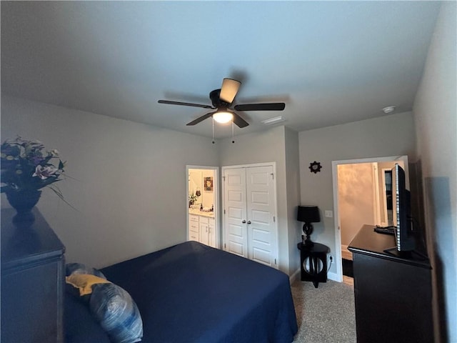 carpeted bedroom featuring baseboards, a closet, and ceiling fan