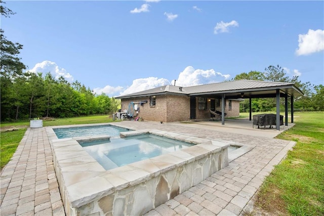 8920A Chunchula-Georgetown Rd, Chunchula, AL 36521 - pool featuring a lawn, an in ground hot tub, a gazebo, and a patio area