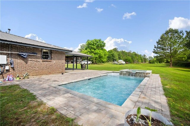 8920A Chunchula-Georgetown Rd, Chunchula, AL 36521 - view of pool with a pool with connected hot tub, a yard, and a patio area