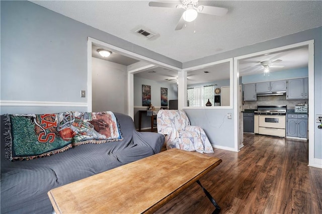 8920A Chunchula-Georgetown Rd, Chunchula, AL 36521 - living room with visible vents, a ceiling fan, dark wood-style flooring, and baseboards