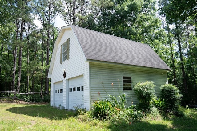 view of side of property with a garage