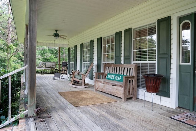 wooden terrace with ceiling fan