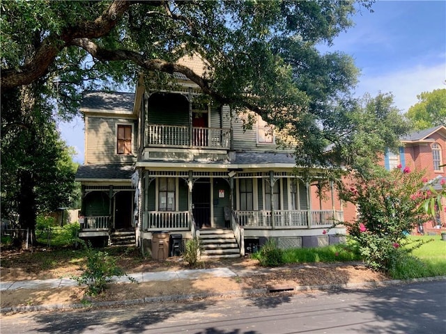 310 N Claiborne St, Mobile, AL 36603 - view of front of home with a balcony and covered porch