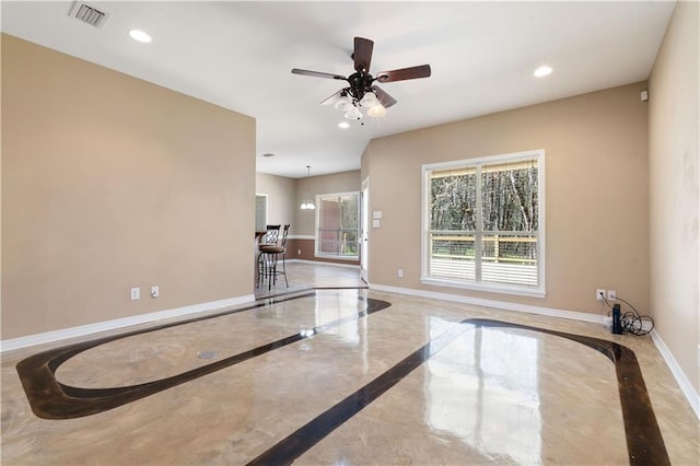 interior space featuring ceiling fan