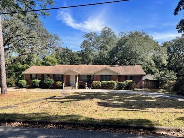 859 Cottage Hill Ave, Mobile, AL 36693 - ranch-style home featuring a front yard and fence