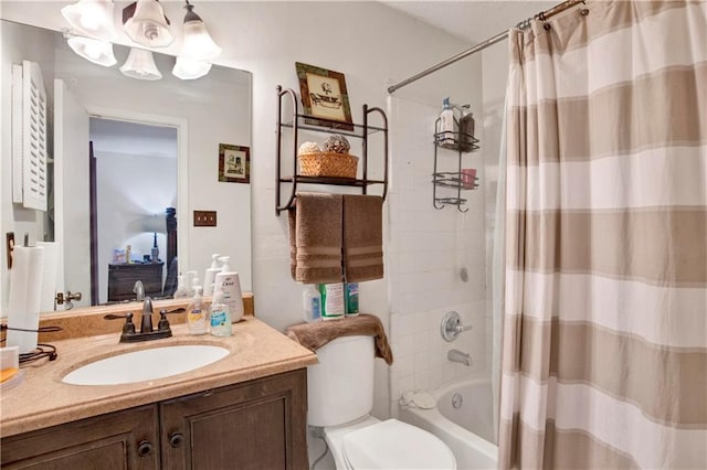 full bathroom featuring vanity, shower / bath combo, and toilet