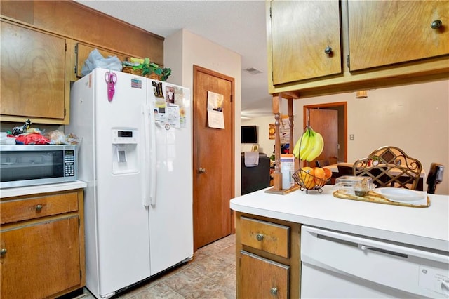 kitchen featuring white appliances