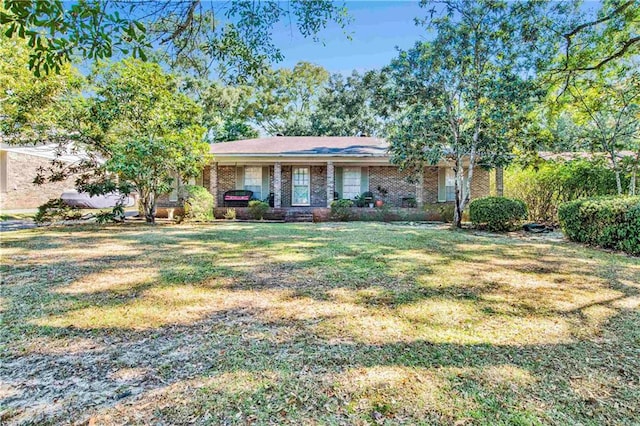 ranch-style house with a front lawn