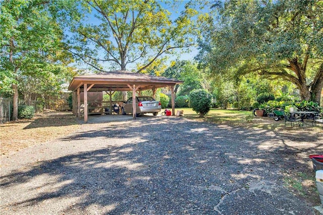 view of car parking featuring a carport