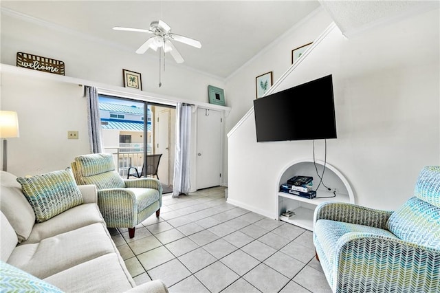 tiled living room with ceiling fan and crown molding