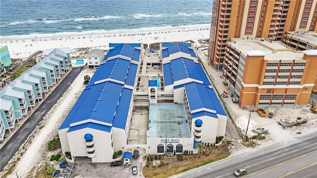 drone / aerial view with a view of the beach and a water view