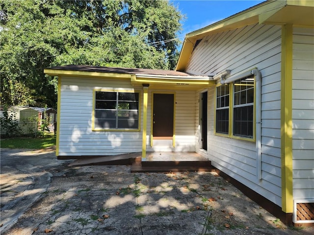 entrance to property with a porch