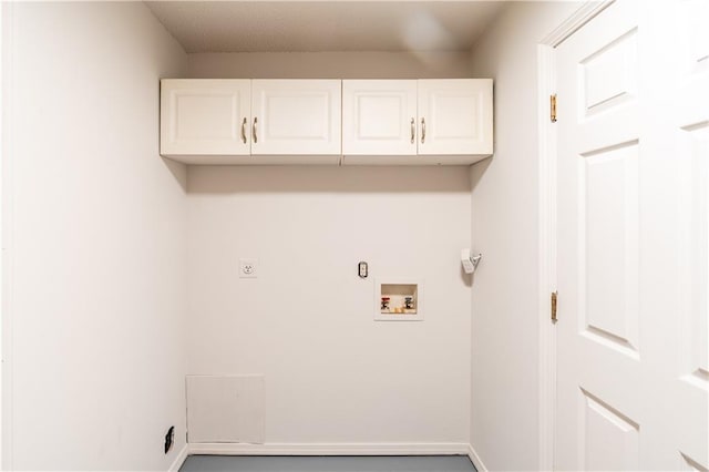 laundry area featuring cabinets, washer hookup, and hookup for an electric dryer