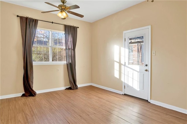 unfurnished room featuring ceiling fan and light hardwood / wood-style floors