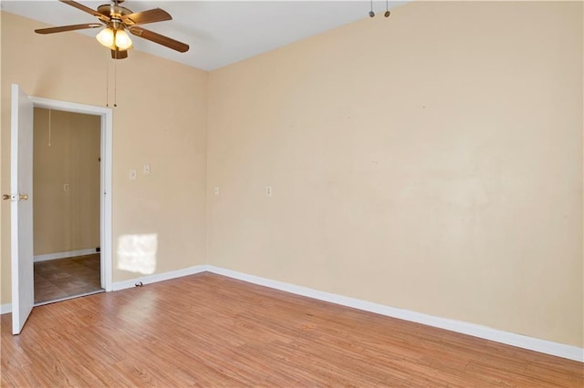 unfurnished room with light wood-type flooring and ceiling fan