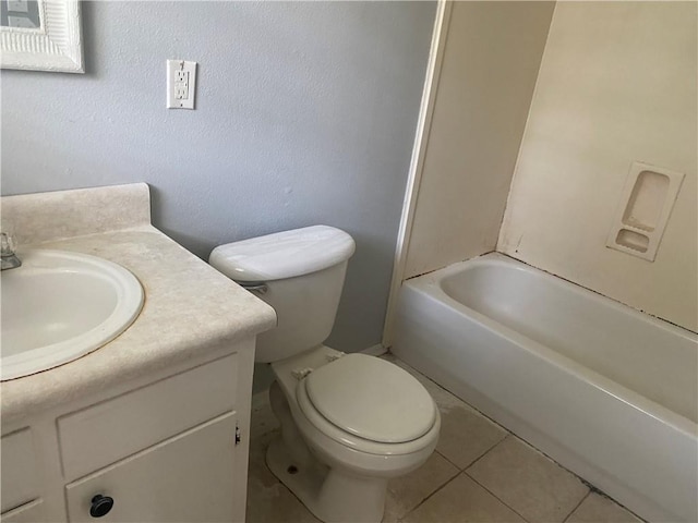 full bathroom with tile patterned flooring, toilet, and vanity