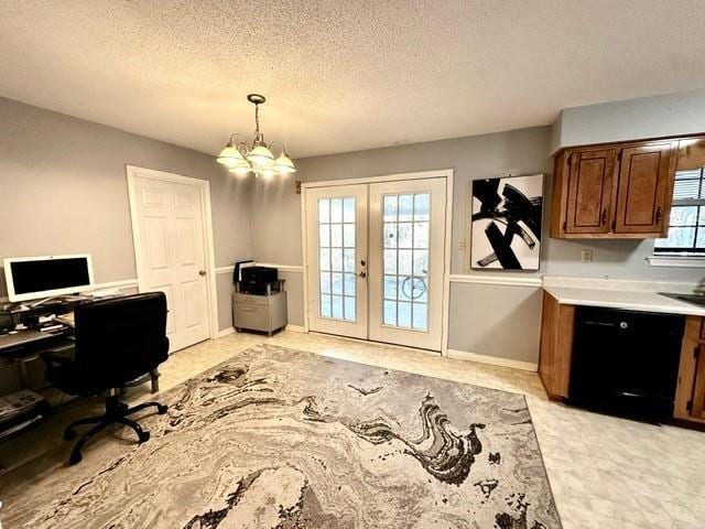 home office with french doors, baseboards, a textured ceiling, and an inviting chandelier