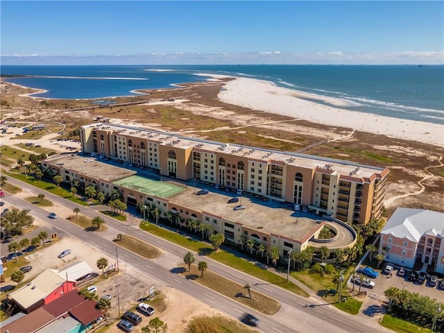 aerial view featuring a water view and a beach view