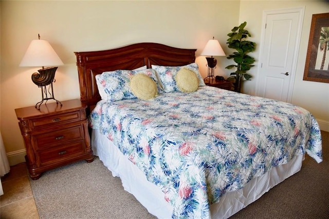 bedroom with light colored carpet