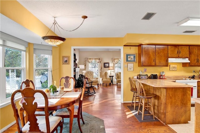 2805 Brookside Dr, Mobile, AL 36693 - dining space featuring a healthy amount of sunlight and hardwood / wood-style flooring