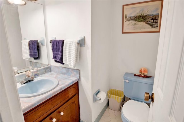2805 Brookside Dr, Mobile, AL 36693 - bathroom with tile patterned flooring, vanity, and toilet
