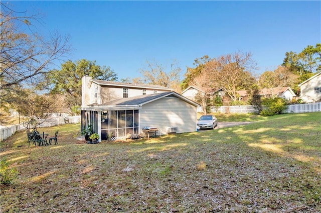 2805 Brookside Dr, Mobile, AL 36693 - rear view of house with a sunroom and a yard