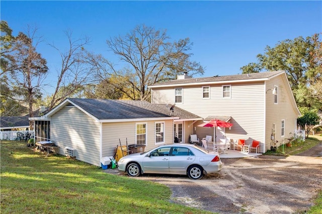 2805 Brookside Dr, Mobile, AL 36693 - rear view of property featuring a patio area and a yard