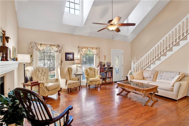 2805 Brookside Dr, Mobile, AL 36693 - living room featuring ceiling fan, hardwood / wood-style floors, and high vaulted ceiling