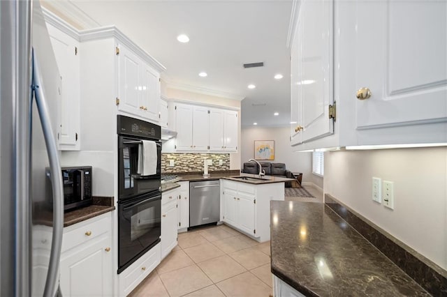 kitchen with white cabinetry, sink, kitchen peninsula, and black appliances