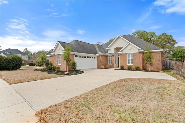 view of front of house with a garage and a front yard