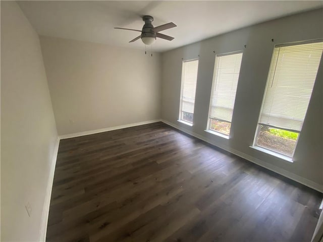9424 Johnson Rd S, Mobile, AL 36695 - empty room featuring baseboards, dark wood finished floors, and ceiling fan