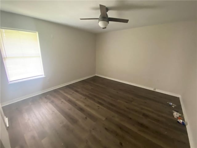 9424 Johnson Rd S, Mobile, AL 36695 - unfurnished room with dark wood-style floors, baseboards, and a ceiling fan